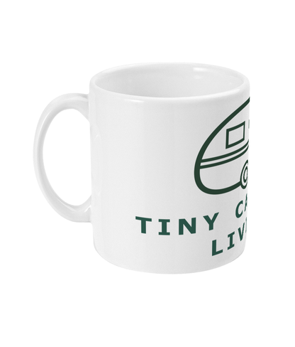 White Tiny Caravan Living logo ceramic mug with handle on the left
