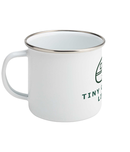 White Tiny Caravan Living Caravan logo enamel mug with handle on the left