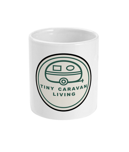 White ceramic mug with Tiny Caravan Living Signature Badge
