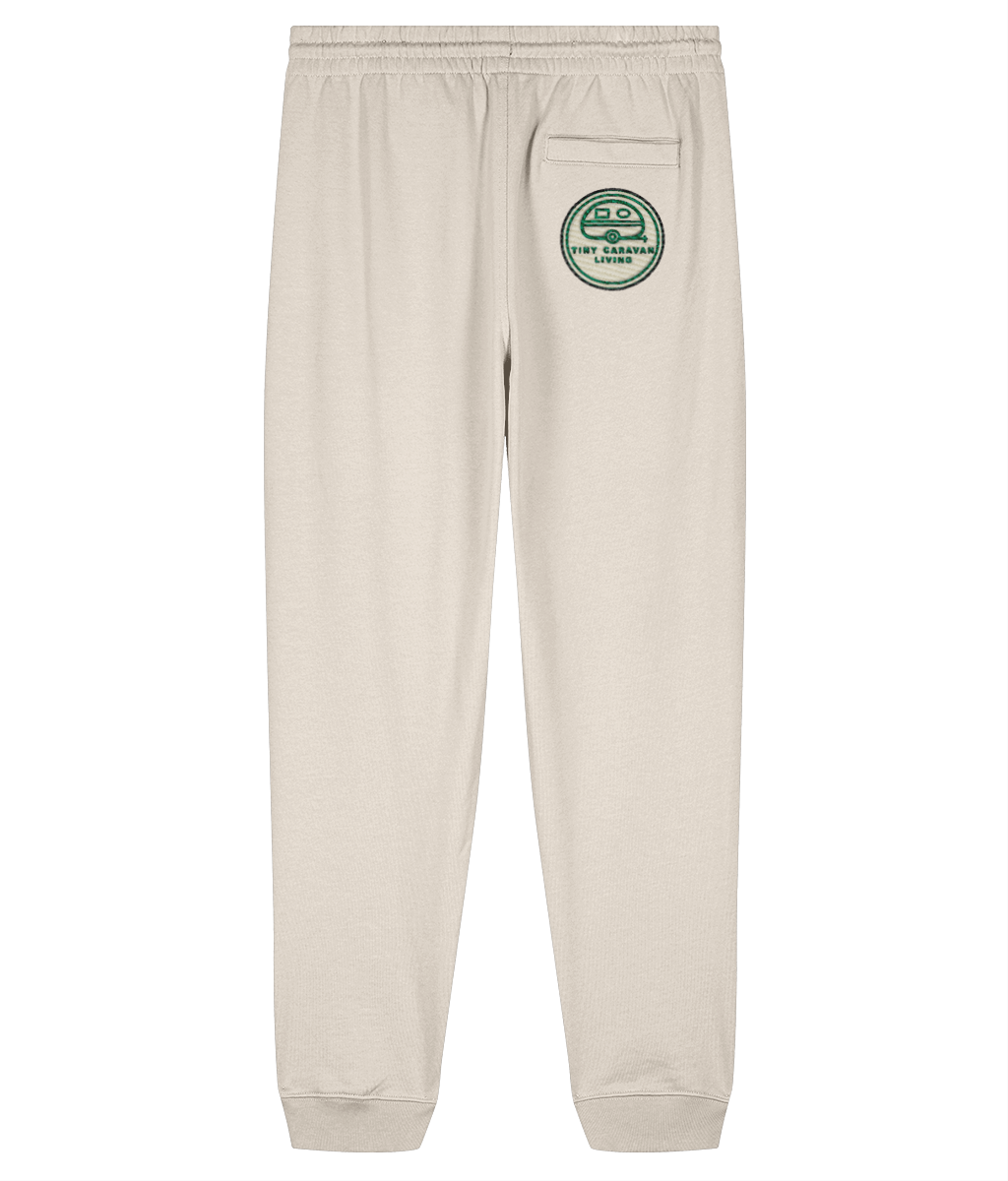 Rear view of Tiny Caravan Living Signature Joggers in Natural Raw with embroidered badge on the right pocket