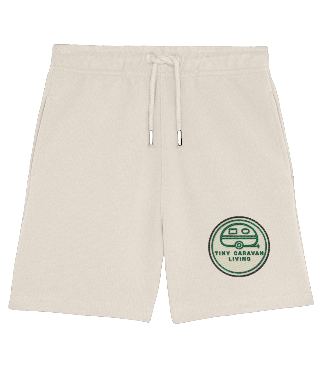 Tiny Caravan Living Signature Kids’ Shorts in Natural Raw with embroidered badge on the front left leg