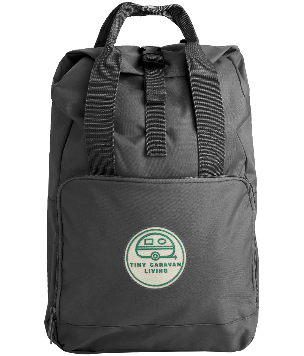 Tiny Caravan Living Signature Roll-Top Backpack in Black with embroidered signature badge