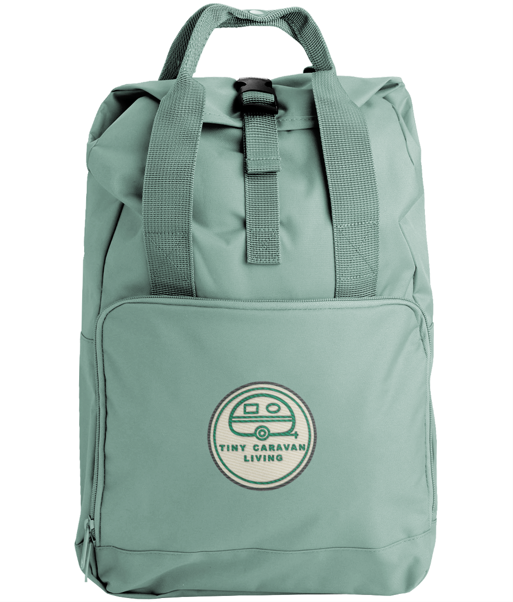 Tiny Caravan Living Signature Roll-Top Backpack in Sage Green with embroidered signature badge